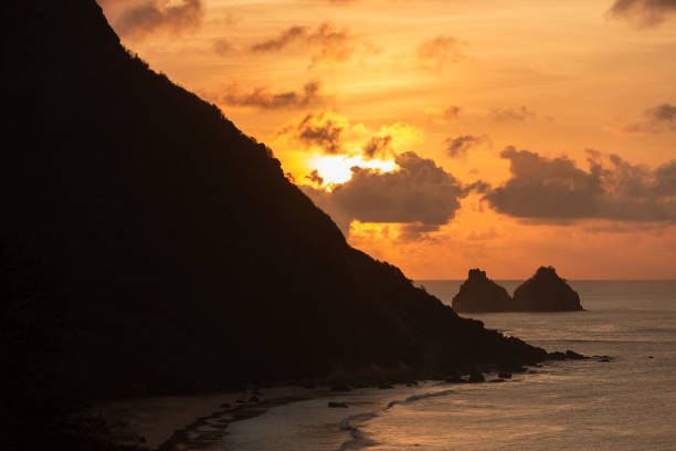 istock Sunset over the sea and mountains 1201867317