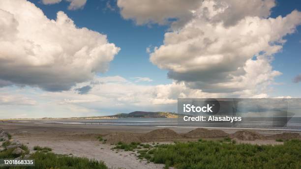 Dollymount Strand Dublin Ireland Stock Photo - Download Image Now - Beach, Beauty In Nature, Cloudscape
