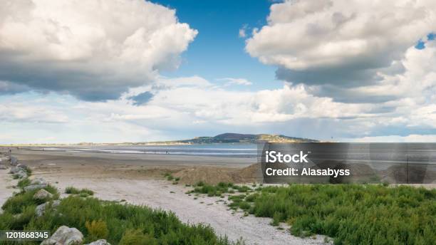Dollymount Strand Dublin Ireland Stock Photo - Download Image Now - Beach, Beauty In Nature, Cloudscape