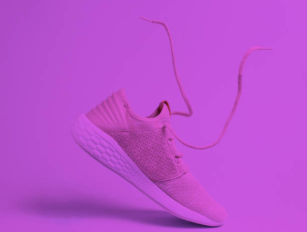 istock Running sports shoes with flying laces. Duotone effect 1201868582