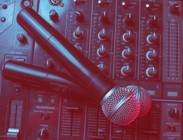 istock Night club, nightlife concept. Disco. Two microphone on DJ remote. Duotone effect 1201872272