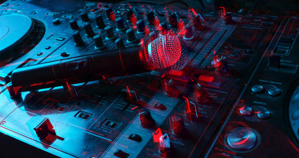 istock Night club, nightlife concept. Disco. Microphone on DJ remote. Neon red blue light.  Glitch effect 1201872277