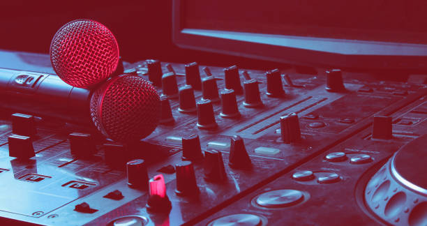 istock Night club, nightlife concept. Disco. Two microphone on DJ controller. Duotone effect 1201872316