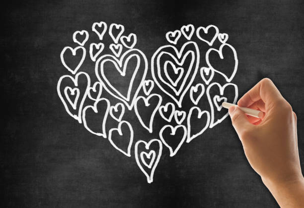 istock Love heart symbol on a blackboard 1201877793