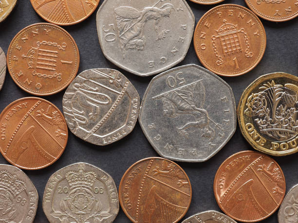 istock Pound coins, United Kingdom 1201879556