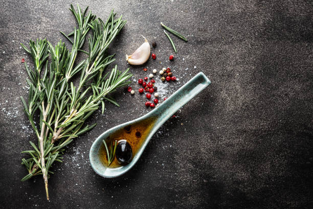 istock Spices and herbs on dark background 1201880203