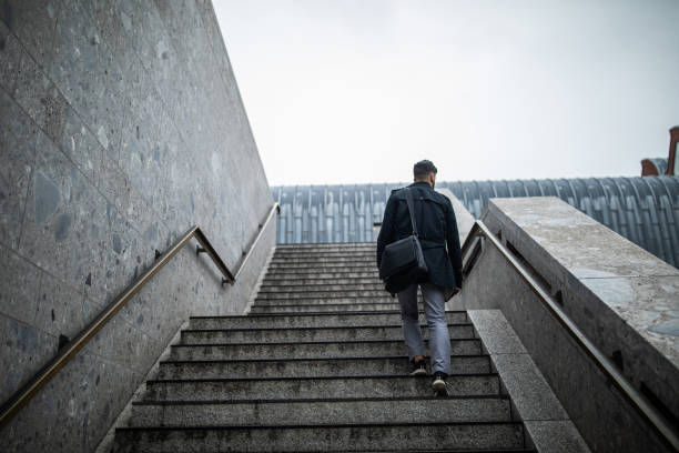 istock Man moving up on stairs in Cologne 1201881995
