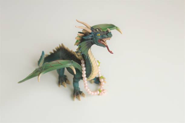 istock Dragon toy and white background. 1201887886