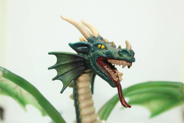 istock Dragon toy and white background. 1201887888