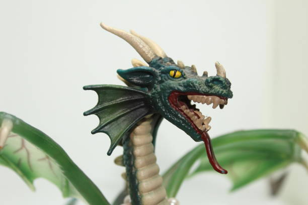 istock Dragon toy and white background. 1201887906