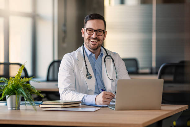istock Happy doctor looking at camera 1201889044