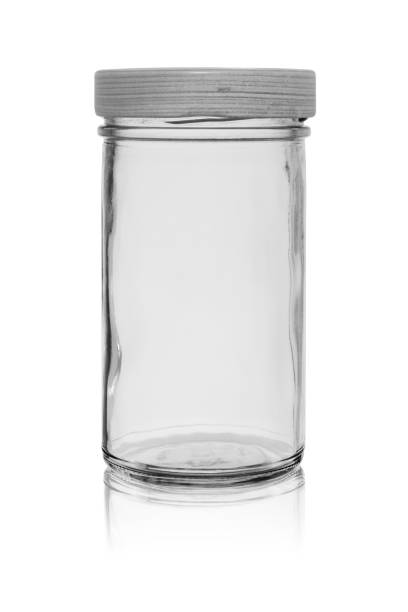istock Empty glass jar with a lid. Isolated on a white background with reflection 1201889221