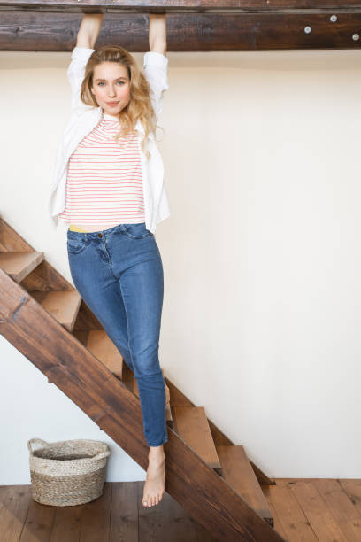 istock Attractive young woman looking straight at camera 1201891188