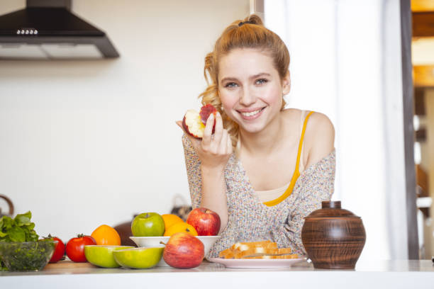 istock Cheerful young woman keeping smile on her face 1201891703