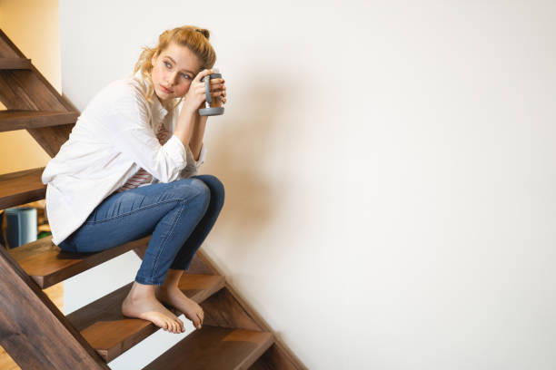 istock Attractive young woman being deep in thoughts 1201891889