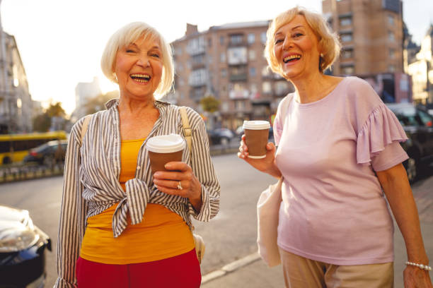 istock Friends being happy taking a walk together 1201892543