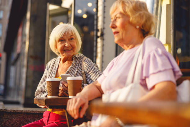 istock Friends spending their evening in the street cafe 1201892548