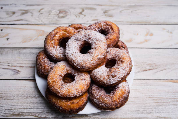 istock donuts on a wooden background 1201895137
