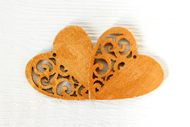istock Valentine's Day, zero waste. Two wooden hearts on a light background, holiday background, wedding, birthday 1201896211