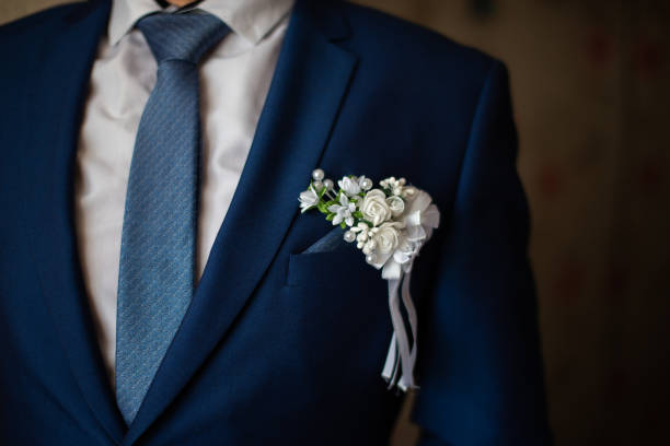 istock Handsome strict blue groom's robe and blue tie. White shirt. 1201898148