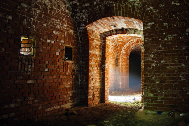 istock Light at the end of tunnel. Passage in abandoned German fortification 1201898529