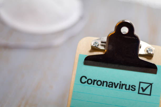 Coronavirus 2019-nCOV medical still life concept Coronavirus 2019-nCOV medical still life concept on clipboard with mask and needles antibiotic resistant photos stock pictures, royalty-free photos & images