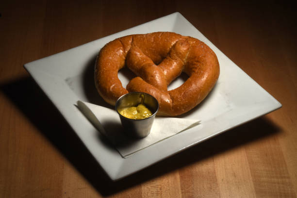 istock Pretzel with Mustard Begins 1201899928