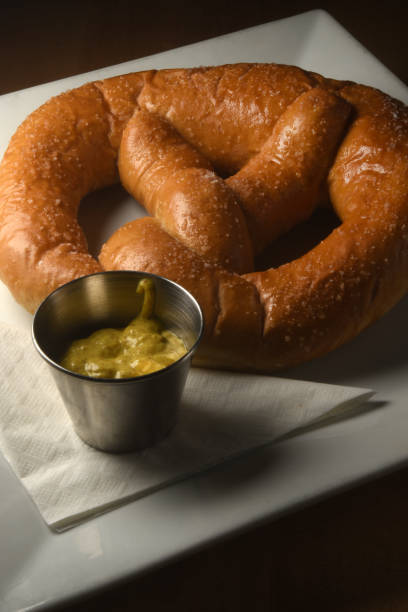 istock Pretzel with Mustard Shown 1201900222