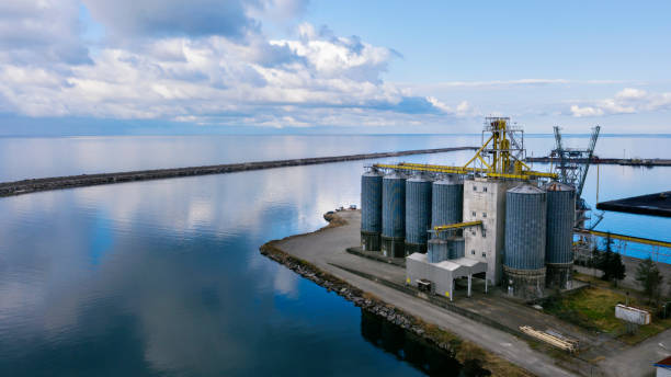 istock Aerial view of silos in a port. 1201901097