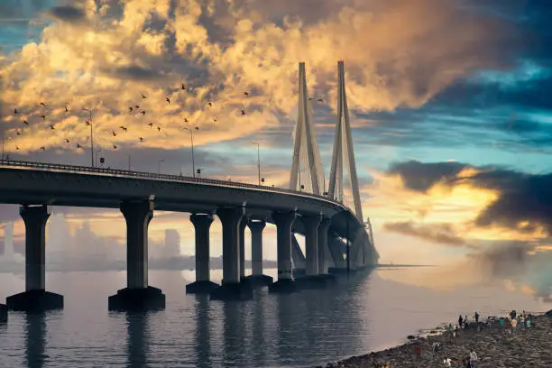 The bandra worli sea link shot at dusk in mumbai india a famous landmark that connects the city. This marvel of engineering has now become a common sight from the bandstand coast