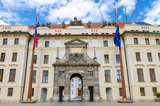 Matthias Gate of New Royal Palace (Novy kralovsky palac) and EU and Czech flags at flagpole in Prague Castle Hradcany, Lesser Town Mala Strana district, Bohemia, Czech Republic