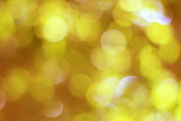 istock Bokeh with a yellowish orange background 1201906944