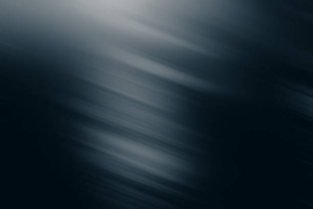 istock Abstract blurred background in blue tonality light spots and slant lines. 1201908105