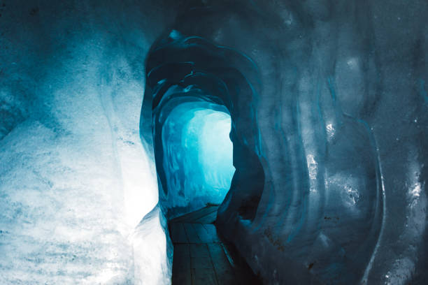istock Exploring the beauty of glacier world inside the ice cave in Switzerland 1201908310