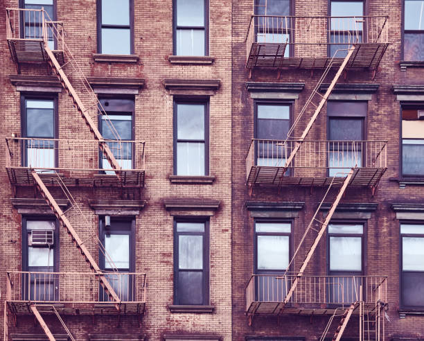 istock Residential building with fire escapes, Manhattan, New York. 1201909148
