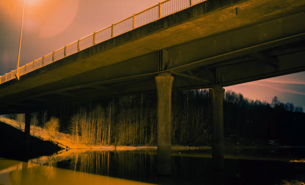 istock bridge over the frozen river during the night 1201909315