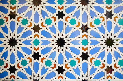 Al-andalus tile background in the royal palace of Seville, Spain