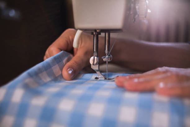 istock Woman Working on a Sewing Machine 1201912175