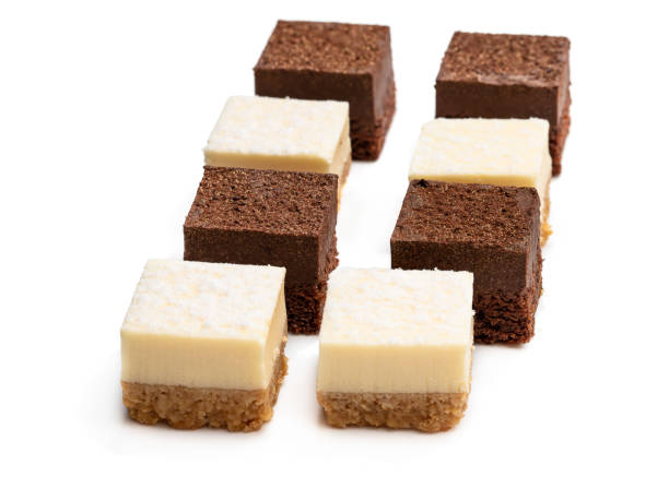 istock Set of mini chocolate and vanilla cheesecake bites isolated on white 1201913811