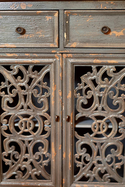 istock Old carved wooden cupboard doors.The peeled paint 1201915440