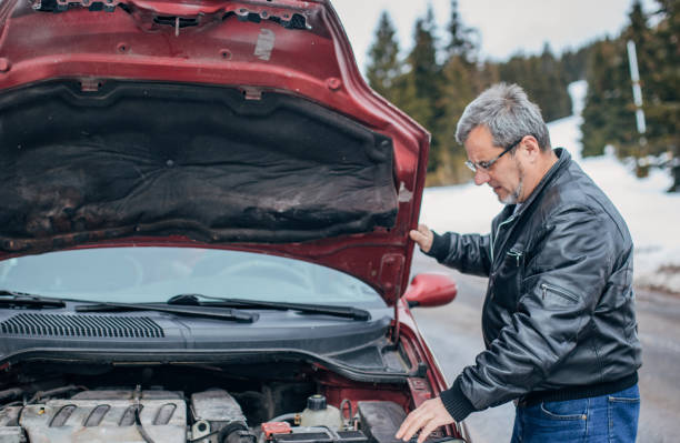 istock Car breakdown in winter in a mountainous area 1201916387