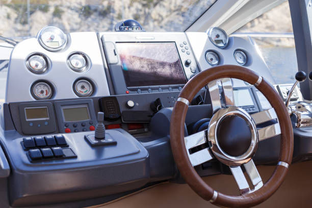 istock Steering wheel and control panel on a luxury yacht 1201916410
