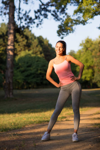istock Woman exercising in the summer nature 1201917794