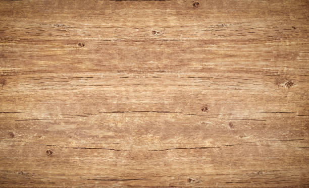 wood texture background. top view of vintage wooden table with cracks. light brown surface of old knotted wood with natural color, texture and pattern. - knotted wood wood dirty weathered imagens e fotografias de stock