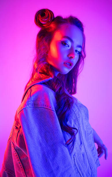 fashion model girl in neon lights - neon light fotos imagens e fotografias de stock