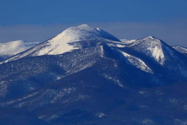 istock Iwate prefecture blue sky and snowy mountain landscape 1201931139