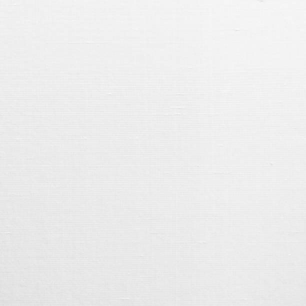 istock Fine natural cotton silk fabric wallpaper texture pattern background in light white color tone 1201935684