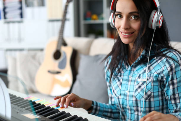 istock Woman in music studio 1201937180
