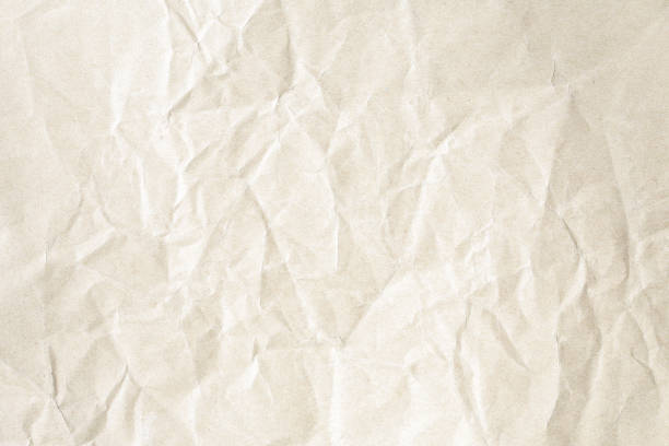 istock Crumpled brown paper background texture 1201937484