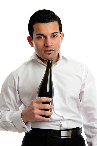 abuso de alcohol; borracho hombre que agarra botella de vino - uncoordinated fotografías e imágenes de stock
